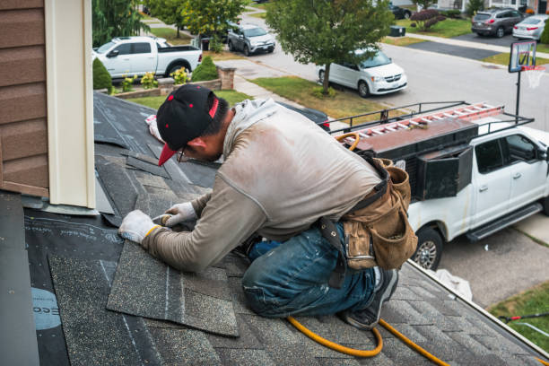 Professional Roofing technician working in Weston, MO